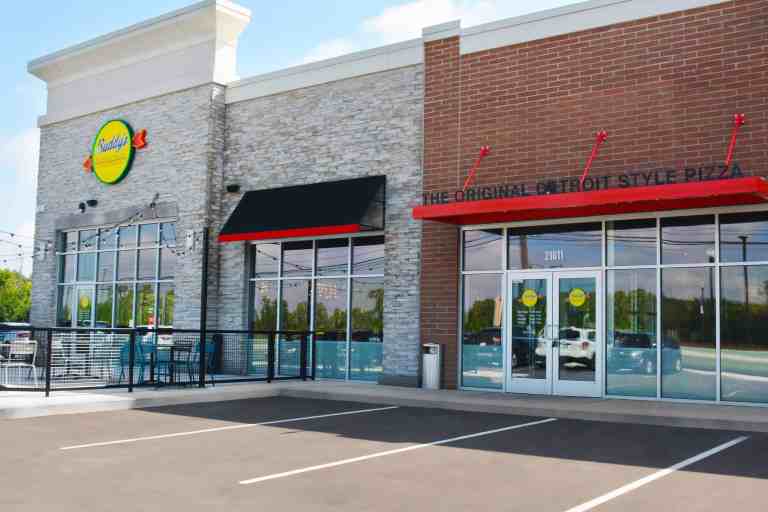 1762222705750 6w8toze8 buddys pizza woodhaven logo 768x512