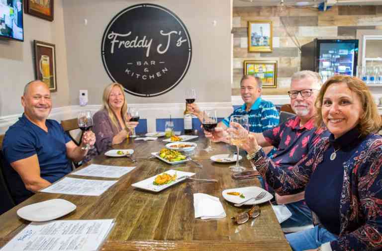 Table Cheersing at Freddy Js Bar and Kitchen 768x505