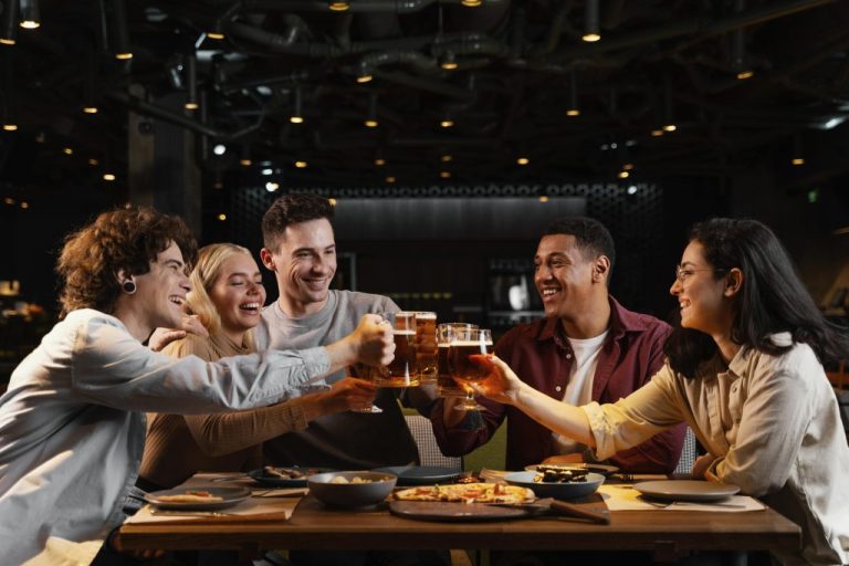 medium shot happy friends with beer mugs 1024x683 1 768x512